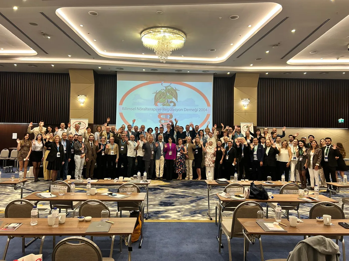 Participants of the XXI Traditional Herget Symposium on Neural Therapy and Regulation Medicine in the meeting hall